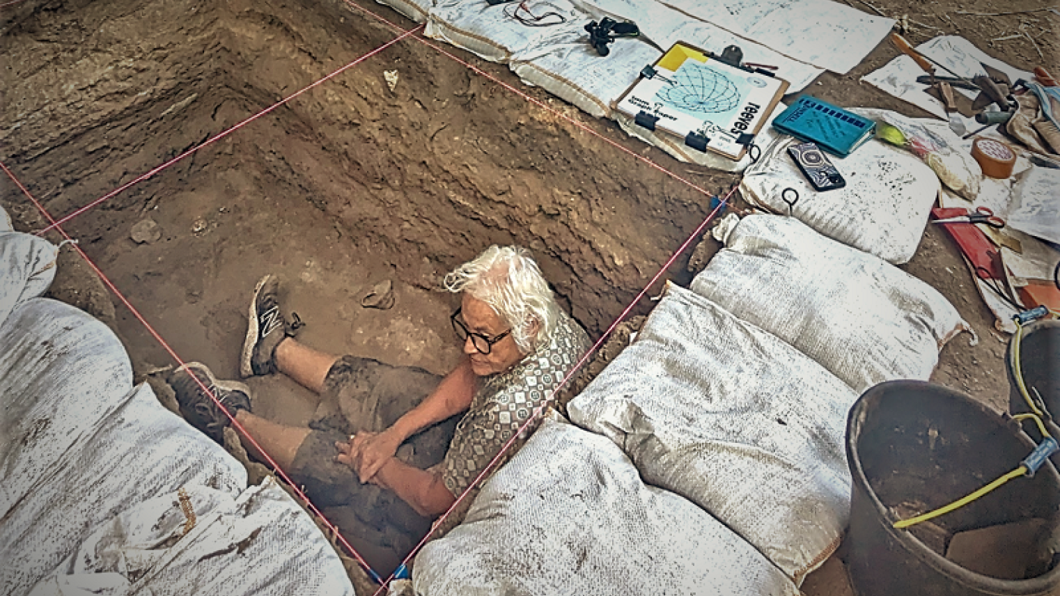 Image: Sue O Connor at the bottom of the test pit was taken at Haknaur Shelter in Wetar Island in June 2024